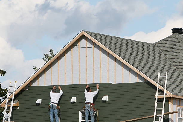 Professional Siding Contractor technician working in Warminster, PA